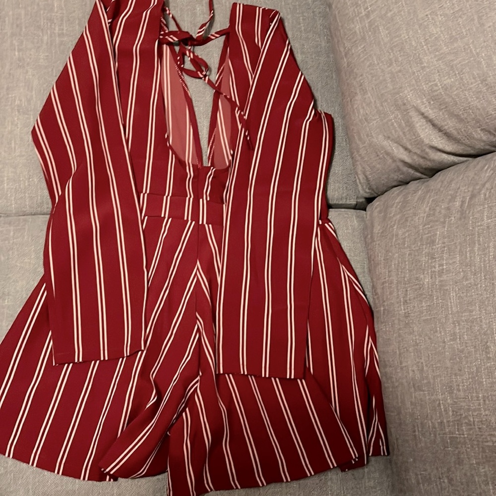 Burgundy and white stripes long sleeve romper says XL fits like a Large